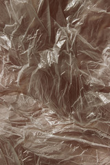 Cropped shot of plastic bag. Cellophane background, close up. Plastic, environment concept.