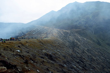 The way to Kawah Ijen Volcano on East Java, covered in mist and clouds in the early morning;