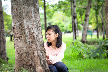 Asian child girl suffering paranoid,scared,stressed,nervous insecure and hallucinations in...
