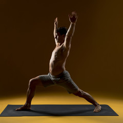 Man practicing yoga pose