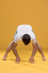 Man stretching in yoga pose