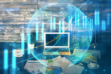Double exposure of forex graph and work space with computer. Concept of international online trading.