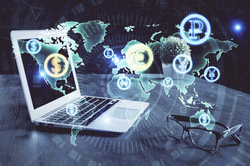 Financial graph colorful drawing and table with computer on background. Double exposure. Concept of international markets.