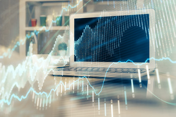 Forex market graph hologram and personal computer on background. Double exposure. Concept of investment.