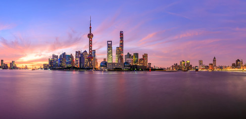 Fototapeta premium Shanghai skyline and modern urban buildings at sunrise,panoramic view.