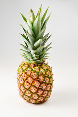 Fototapeta premium Pineapple isolated on white. Space for text or design.