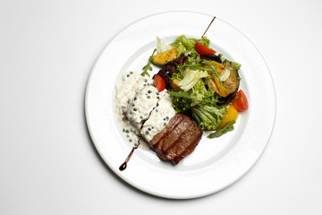 beef medallion in a creamy-rib sauce
