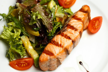 grilled salmon steak with vegetable salad