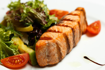 grilled salmon steak with vegetable salad