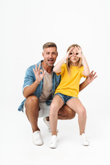 Full length photo of funny caucasian family father and daughter smiling and showing ok sign