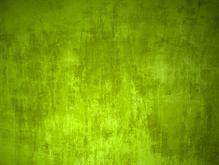 Grün gelbe Betonwand als grunge Hintergrund Textur