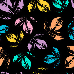 Stylish wallpaper with bright prints of leaves. Colorful leaves of trees on a black background. Seamless pattern of spring leaves.