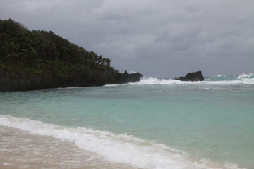 Belize island beach and storm sea