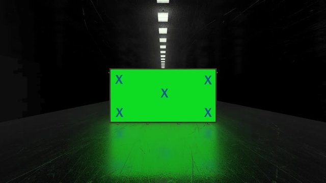 Dark, black futuristic metal corridor and blank green screen alpha channel billboard with tracking markers. Video mock up for advertisement. Camera going to billboard. 