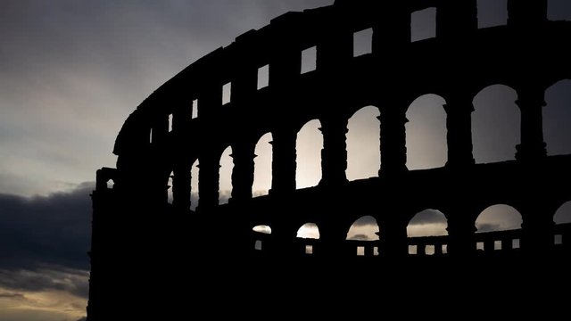 The Colosseum: Time Lapse at Sunrise, Ancient Arena of Gladiator, Famous Landmark and  Symbol of Rome, Capital of Italy, Europe
