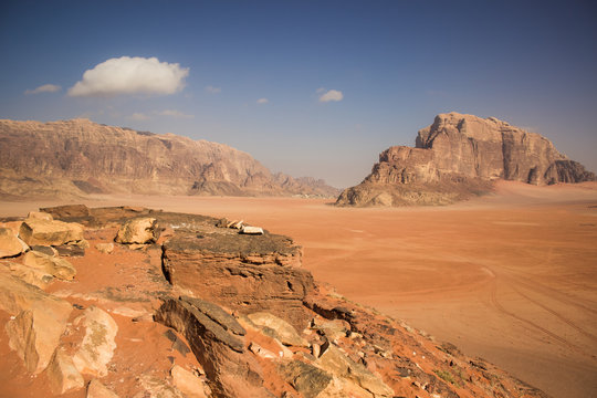 Jordan desert Wadi Rum scenery landscape with sand valley and stone bare rocks and mountains 