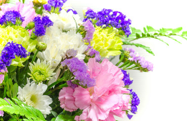 close up of colorful bouquet blooming  mixed  flowers with  droplet, on petal for background.