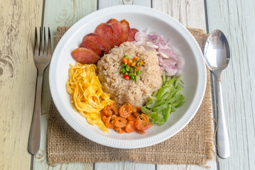 Fried rice with shrimp paste and Side dish on wood background,Thai traditional cuisine.