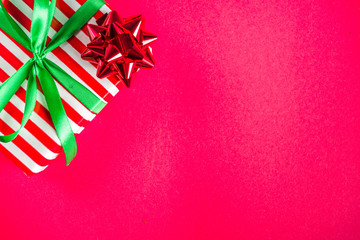 Christmas gift boxes simple pattern background. Festive boxes with Christmas presents, decorated...