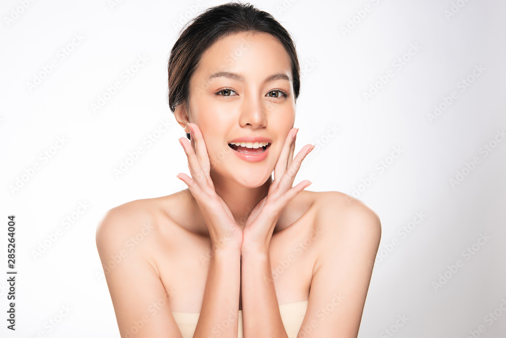 Wall mural Beautiful Young Asian Woman with Clean Fresh Skin,