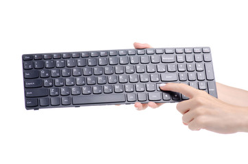 Keyboard for laptop in hand on white background isolation