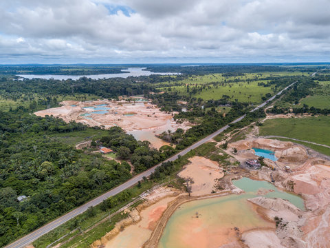 Aerial view of deforestation and destruction of the Amazon rainforest caused by illegal mining of gold and other metals on the BR 364 highway near Jamari National Forest in Rondonia state.