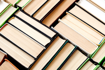 abstraction of books standing vertically top view of the book roots