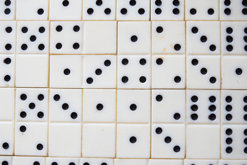 Domino game, dominoes on the wooden table background