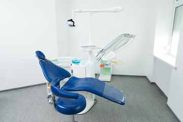 Dentist's office interior with chair and equipment