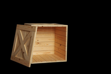 Wooden crate on black background. Space for text