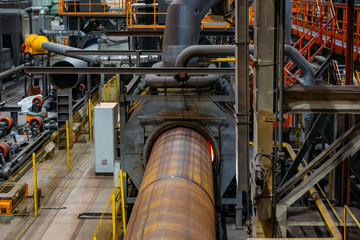 Fototapeta na wymiar Pipe heating in induction oven for polymer coating