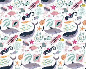 Vector seamless pattern with fish and sea animals. © Andrei