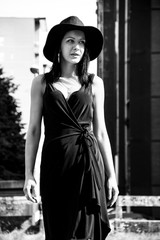 Black haired lady with black hat
