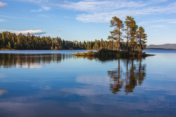 Calm evening at the scenic Lake Saggat near to Arrenjarka in Swedish Lapland, Norrbotten County
