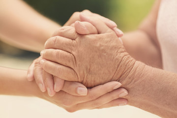People, care and support. Giving helping hand concept
