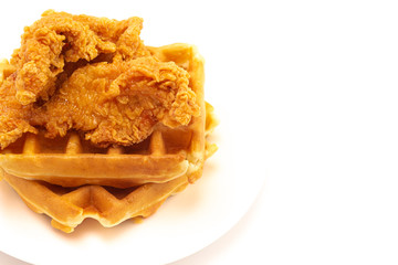 Pile of Chicken and Waffles Isolated on a White Background