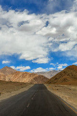 Tourist enjoying scenic view of Magentic Hill area in Leh, India