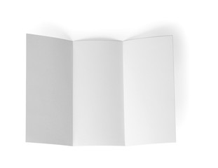 Blank brochure on white background, top view. Mock up for design