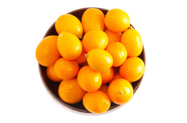 Bowl of Fresh Kumquats Isolated on a White Background