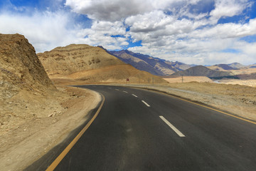 scenic landscape of road, mountain and sky in leh & ladakh, India