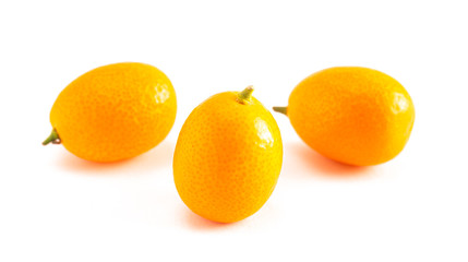 Fresh Kumquats on a White Background