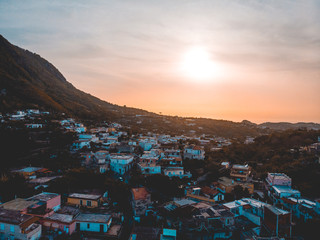 some houses in the mountains in darken colorssome houses in the mountains in darken colors