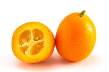 Fresh Kumquats on a White Background