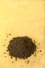 Mung bean on a yellow background. Flat lay. Horizontal. vertical.