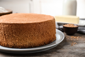 Delicious fresh homemade cake on wooden table, closeup