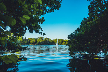 beautiful lake with fountain and green naturebeautiful lake with fountain and green nature