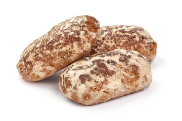 Home baked gingerbread biscuits, isolated on white background