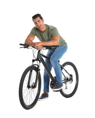 Naklejka premium Handsome young man with modern bicycle on white background