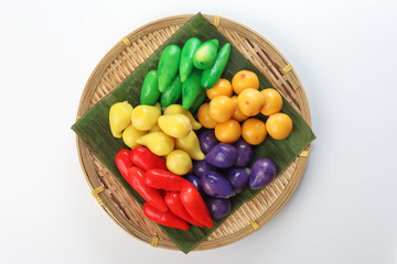 Colourful Luk chup look choop tadeonal Thai desert sweets candy creatve variety bamboo plate banana leaf