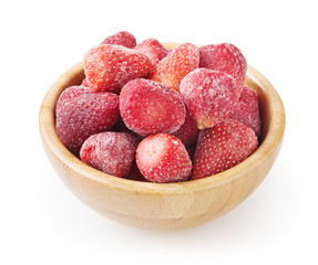 Frozen strawberries in wooden bowl isolated on white background with clipping path